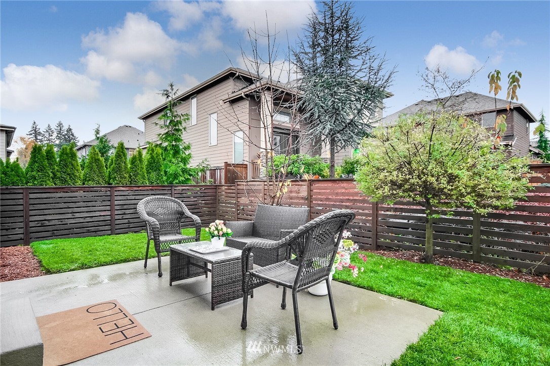 5113 Northeast 11th Place Renton, WA 98059 - Photo 40 of 40 a view of an chairs and table in the back yard