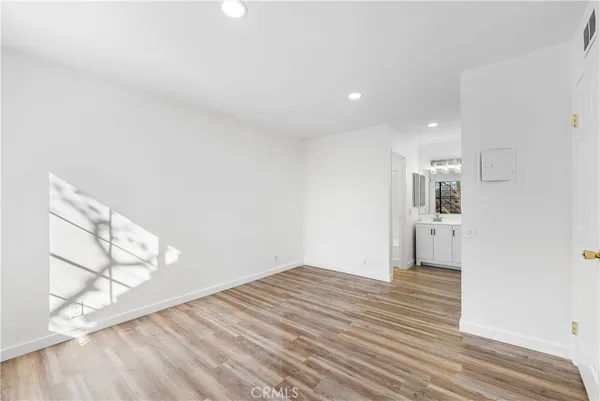 a view of livingroom with wooden floor