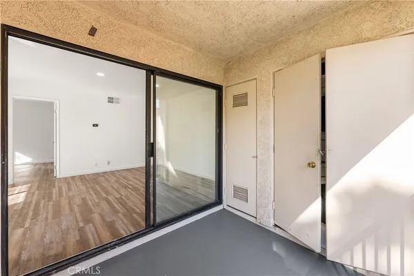 a view of an empty room and window