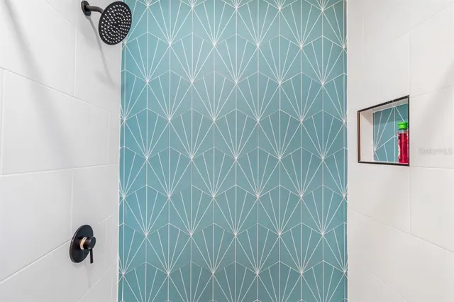 a bathroom with a shower curtain