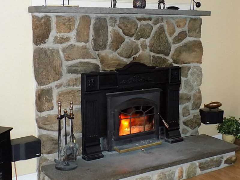 87 Mt Hygeia Road Foster, RI 02825 - Photo 6 of 25 Den/Family/Great Room. Wood stove insert for great warmth