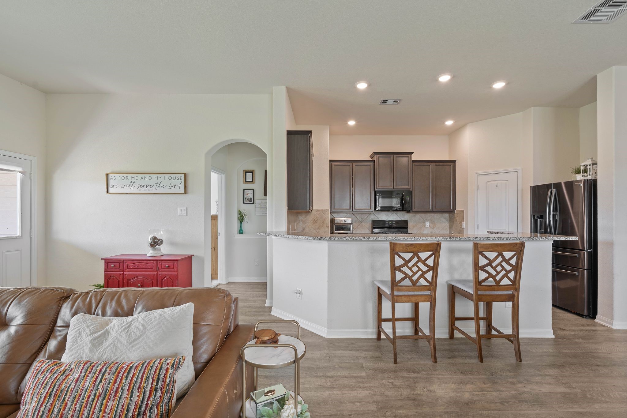 16450 Stonewall Street Conroe, TX 77303 - Photo 12 of 43 Alternate kitchen view featuring ample cabinetry and recessed lighting.