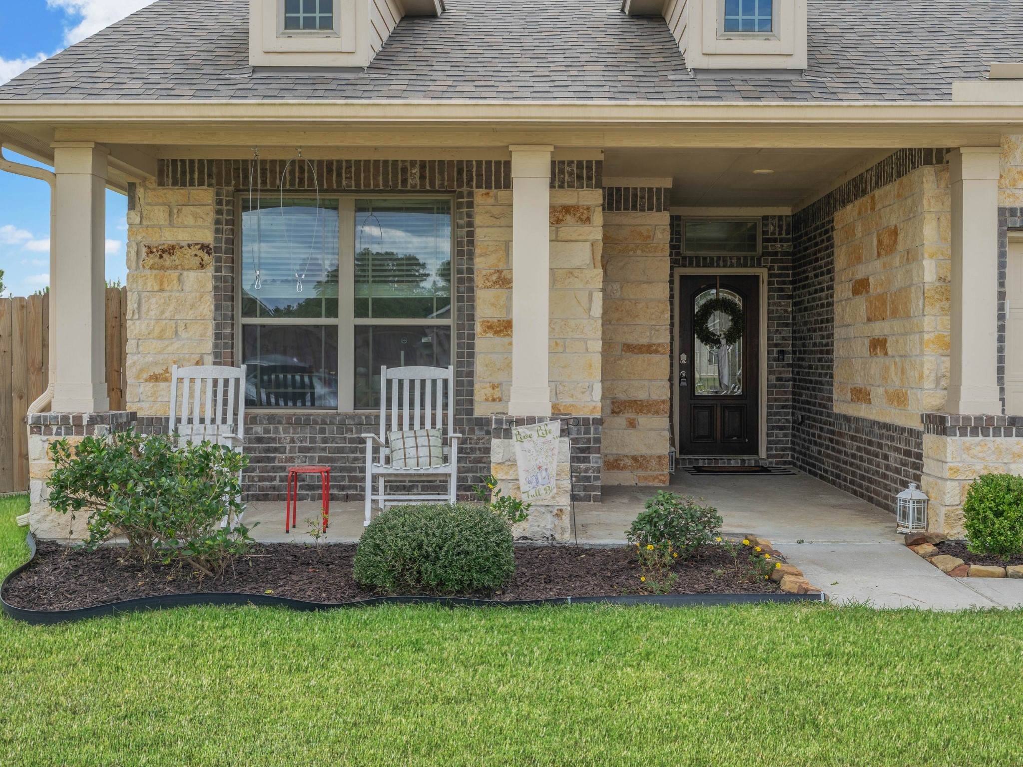 16450 Stonewall Street Conroe, TX 77303 - Photo 2 of 43 Another front exterior view highlighting the garage and landscaped yard.