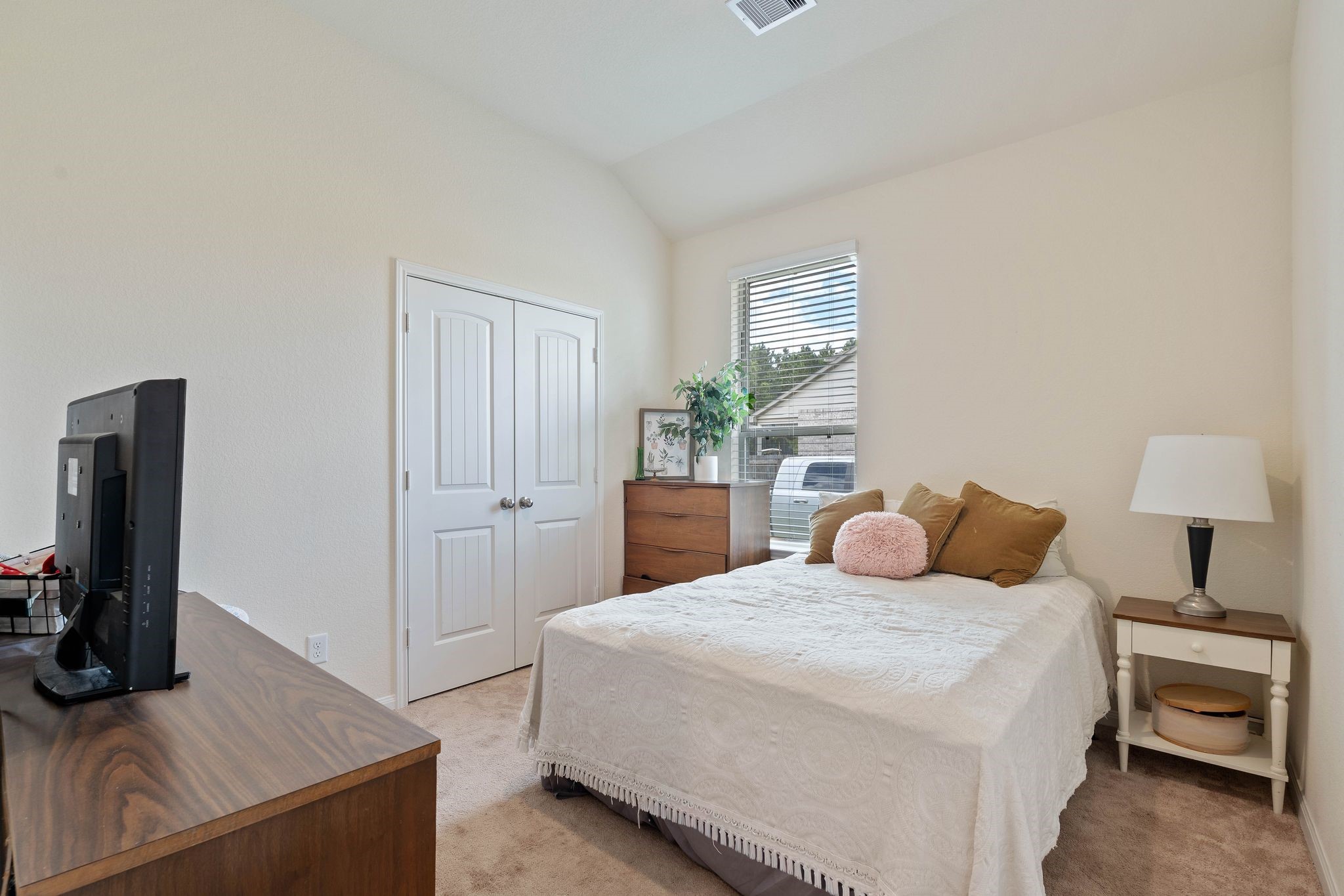 16450 Stonewall Street Conroe, TX 77303 - Photo 23 of 43 Secondary bedroom with ceiling fan and large closet.