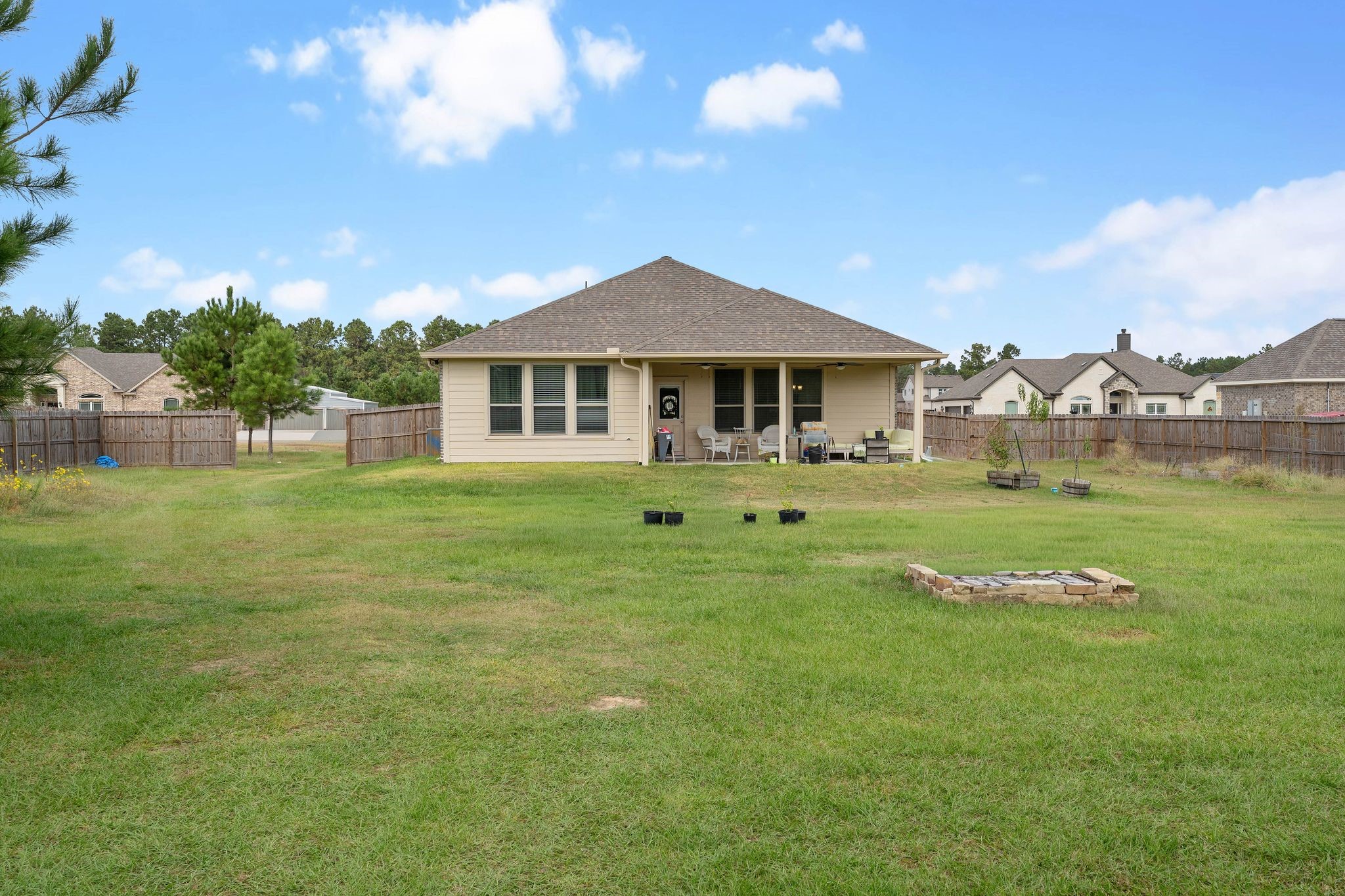 16450 Stonewall Street Conroe, TX 77303 - Photo 32 of 43 Backyard view showing wide open green space.