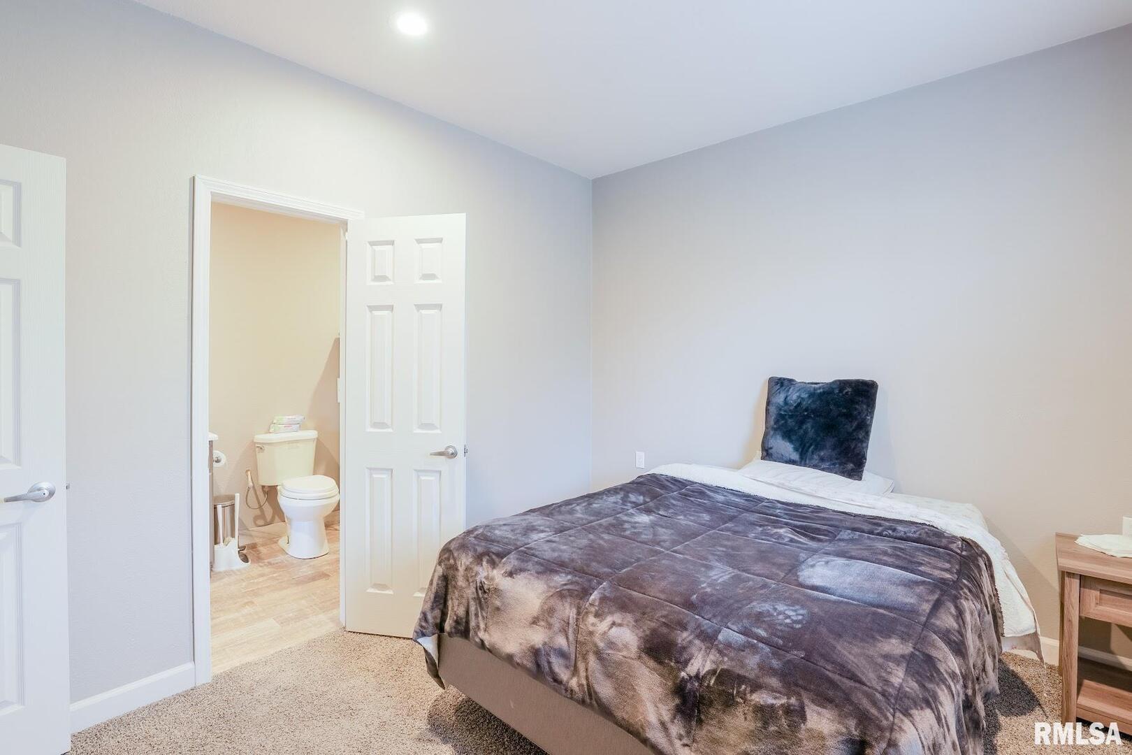 0 Bolen Store Road Thompsonville, IL 62890 - Photo 21 of 52 a bedroom with a bed and walk in closet