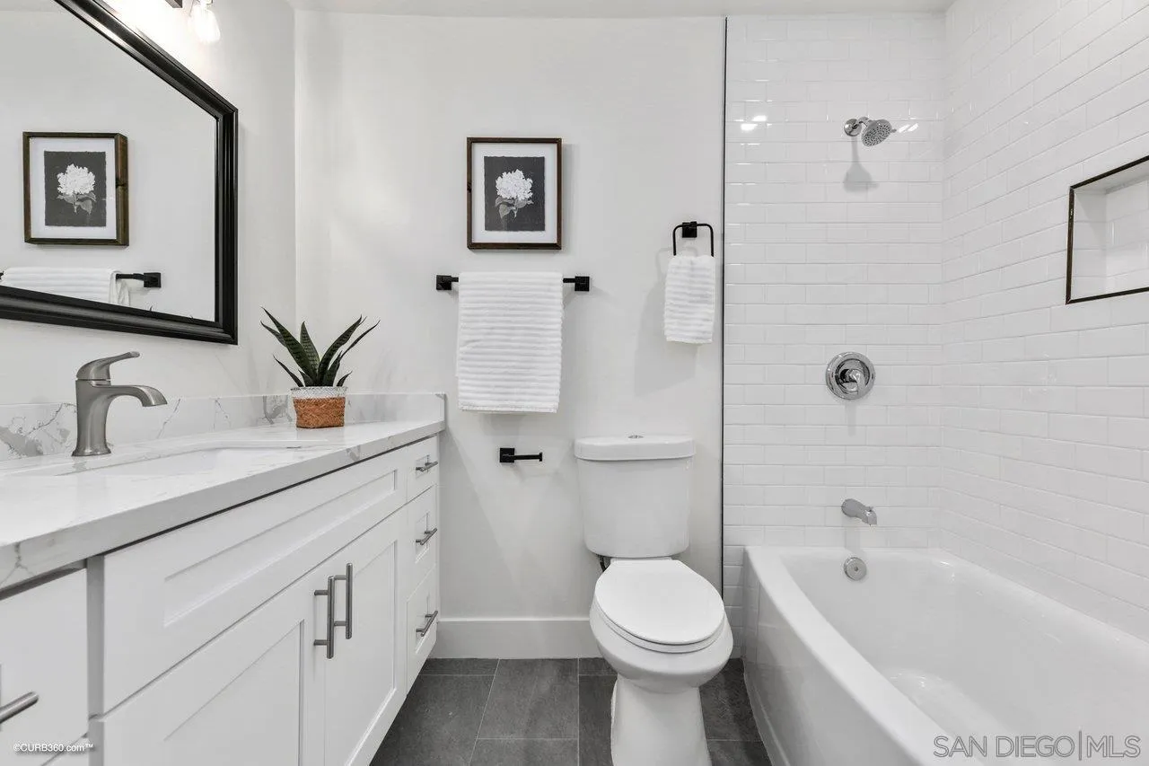 13331 Tobiasson Road Poway, CA 92064 - Photo 17 of 24 a bathroom with a sink a toilet and shower