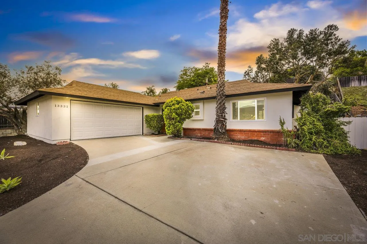 13331 Tobiasson Road Poway, CA 92064 - Photo 24 of 24 a front view of a house with a yard and garage