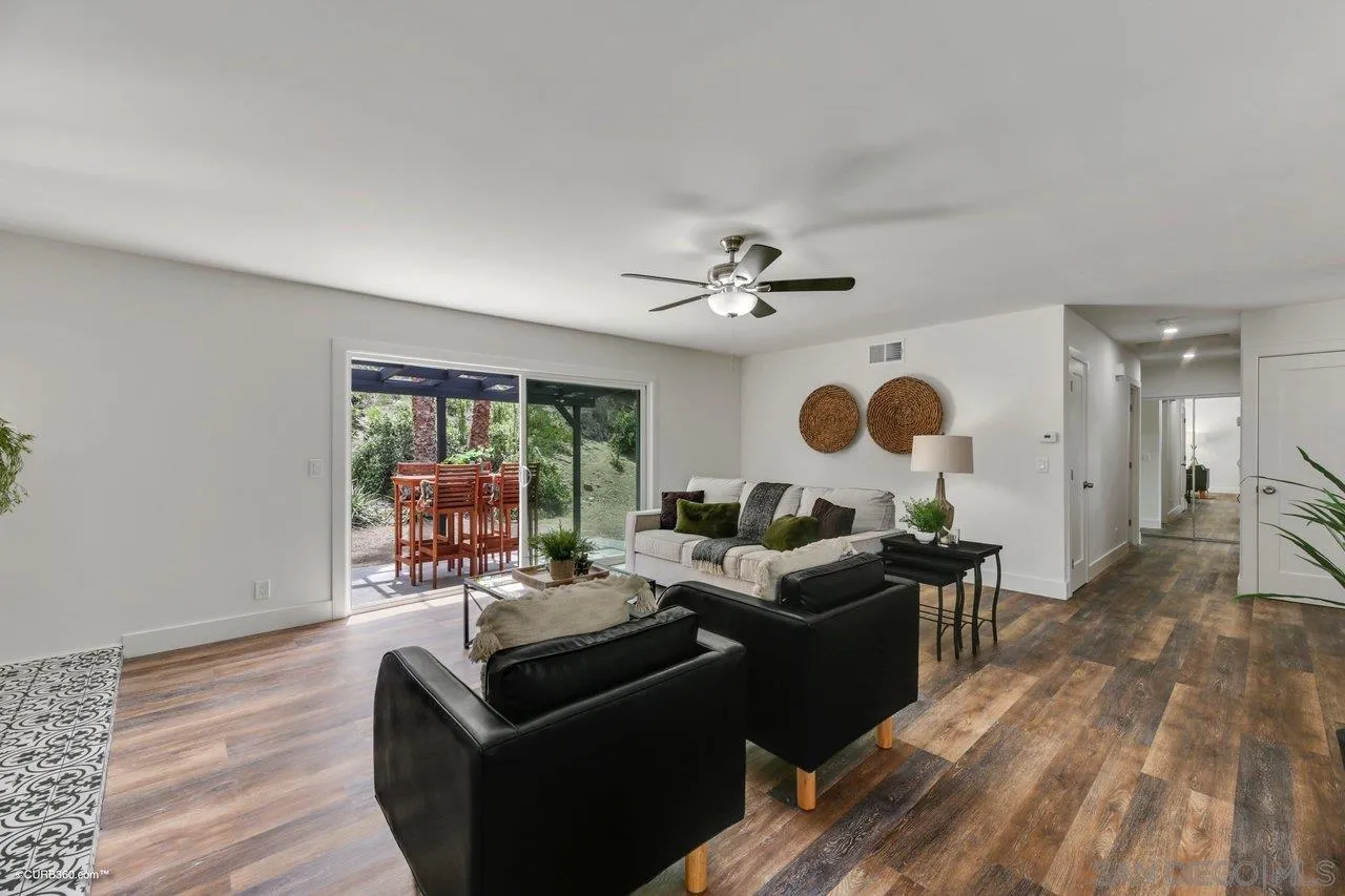 13331 Tobiasson Road Poway, CA 92064 - Photo 3 of 24 a living room with furniture and a large window
