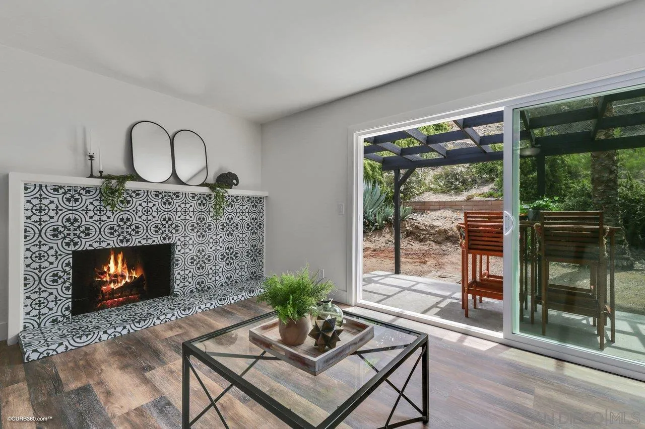 13331 Tobiasson Road Poway, CA 92064 - Photo 5 of 24 a living room with furniture and a fireplace