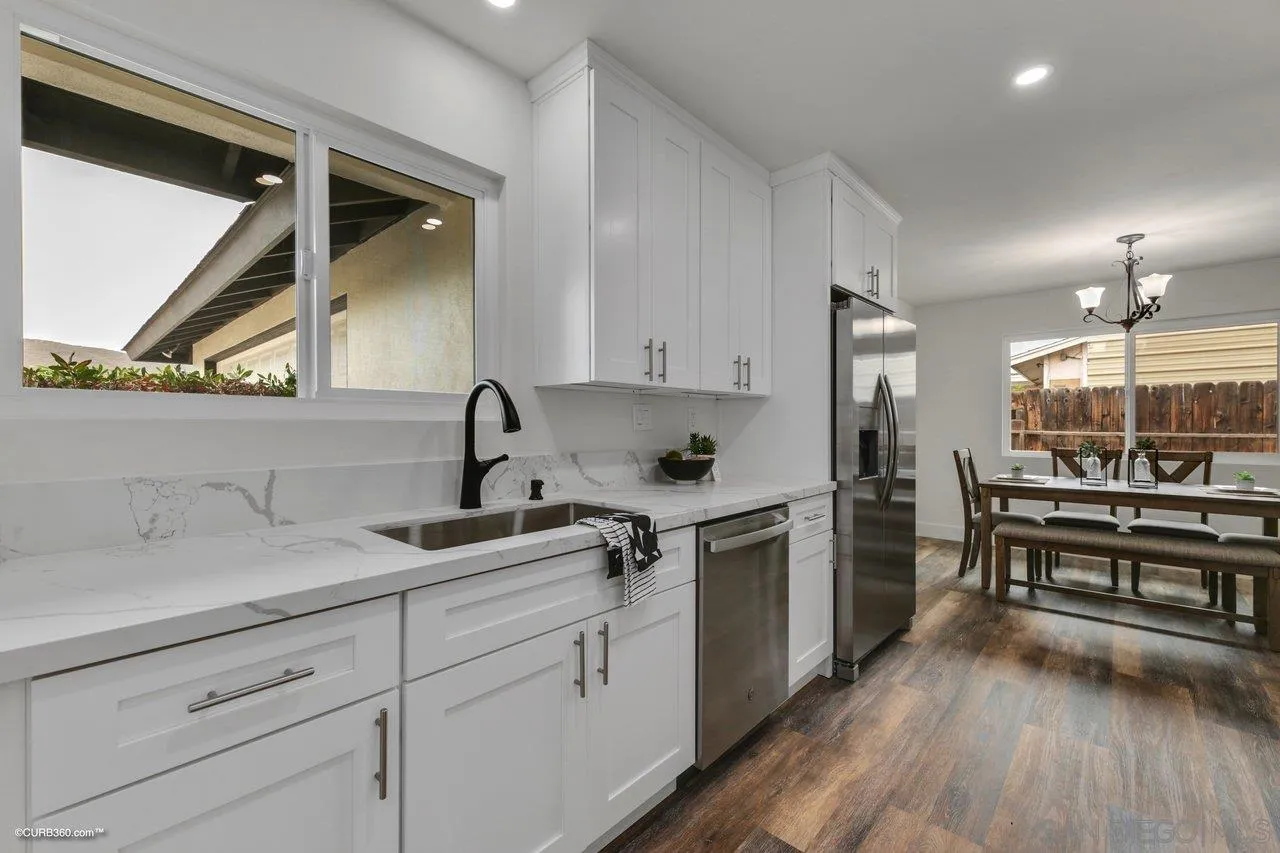 13331 Tobiasson Road Poway, CA 92064 - Photo 6 of 24 a kitchen with a sink and cabinets