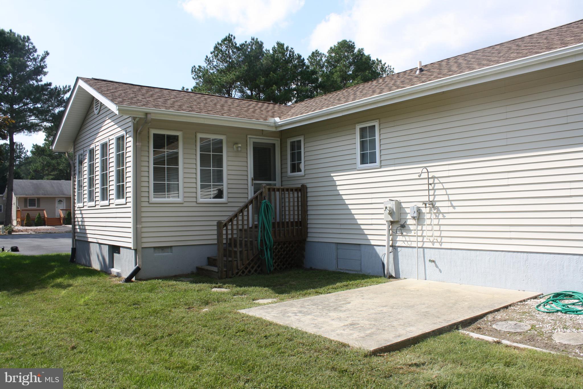3 Bridgewater Road Ocean Pines, MD 21811 - Photo 24 of 30 Back yard entrance from the sunroom