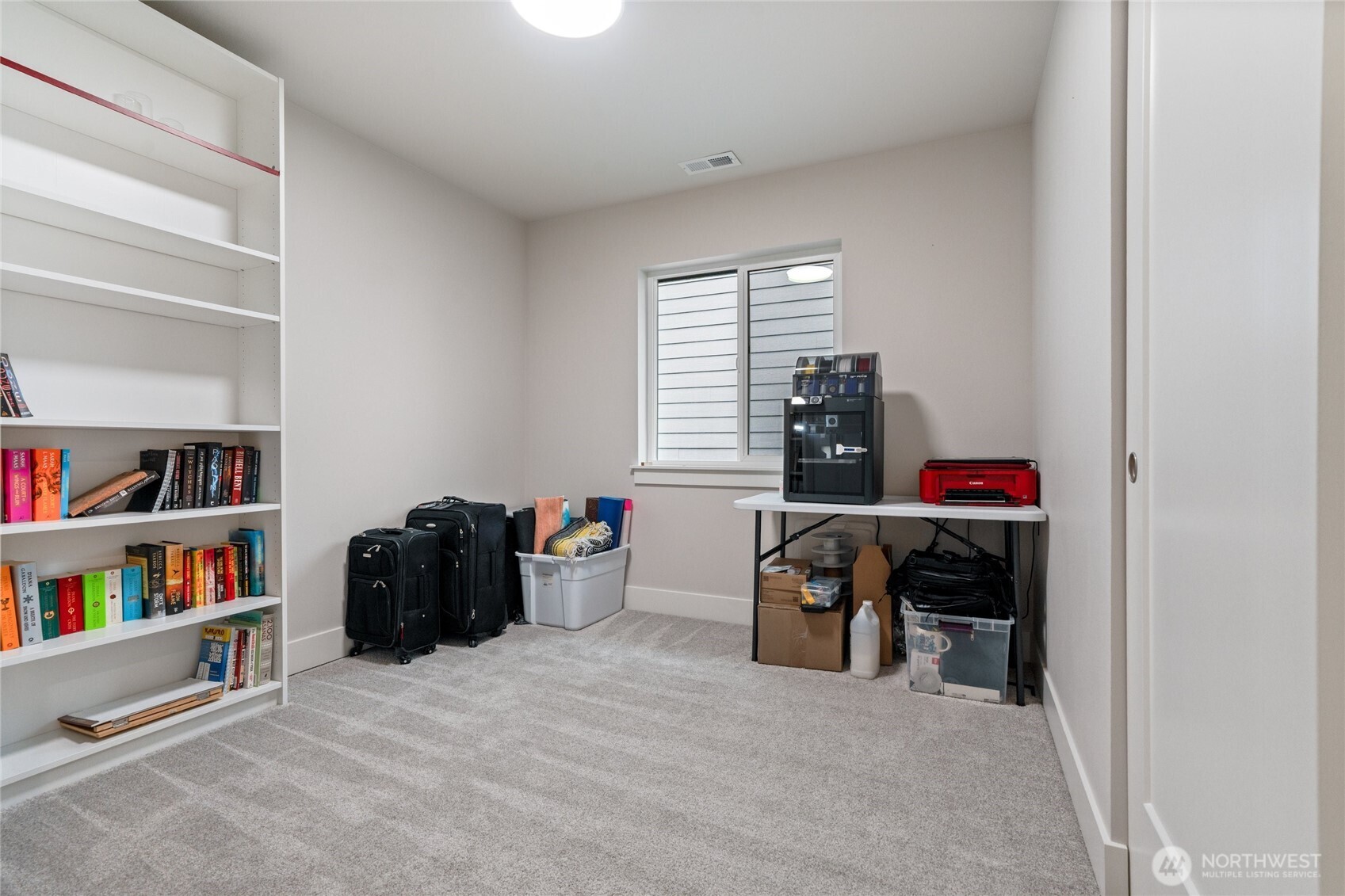 138 Blackfish Court Bremerton, WA 98310 - Photo 18 of 36 a view of a workspace with furniture and a window
