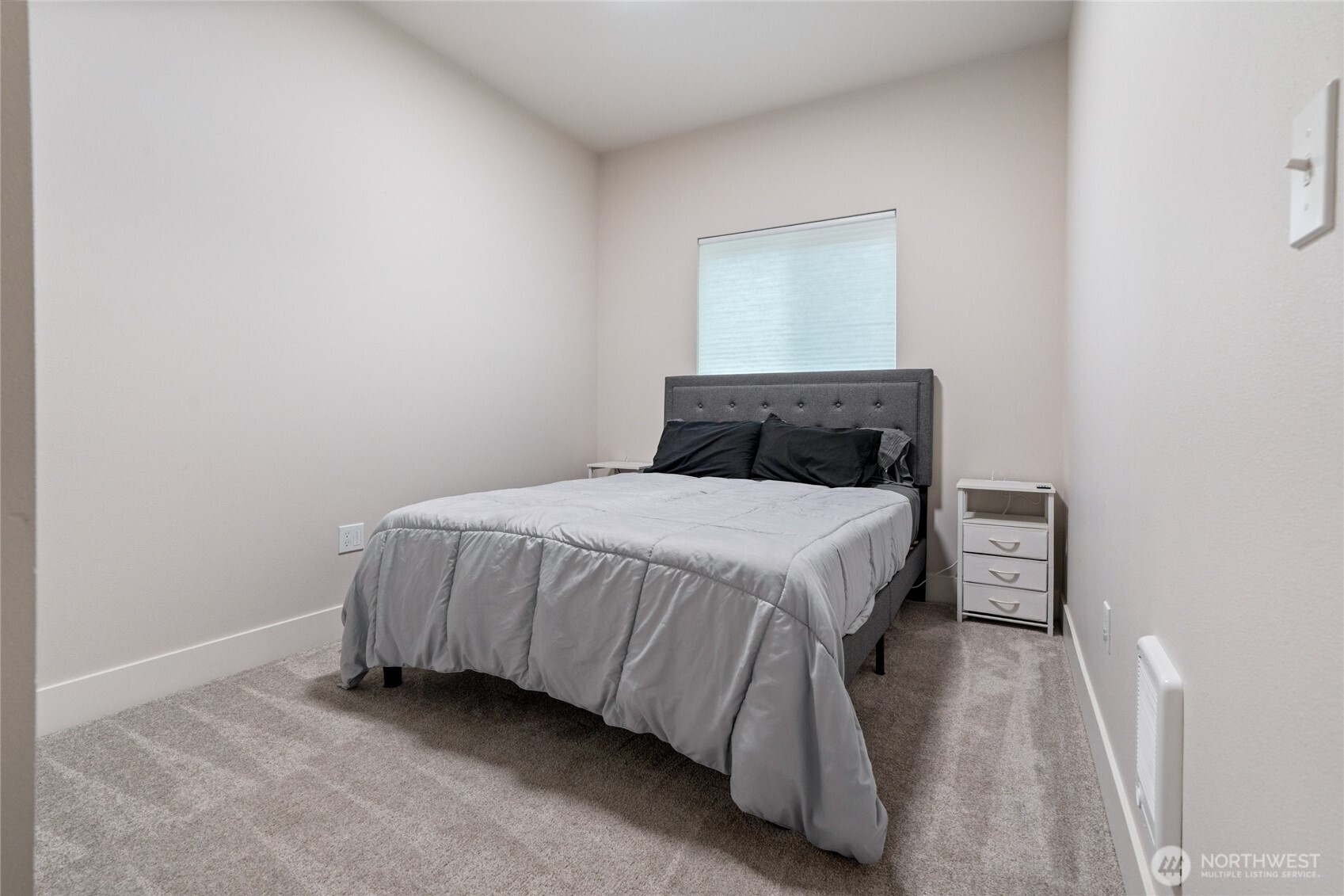 138 Blackfish Court Bremerton, WA 98310 - Photo 19 of 36 a bedroom with a bed and a night stand