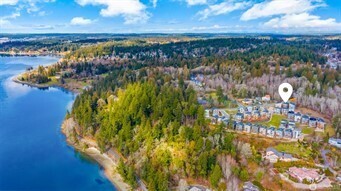 138 Blackfish Court Bremerton, WA 98310 - Photo 35 of 36 a view of a lake from a yard