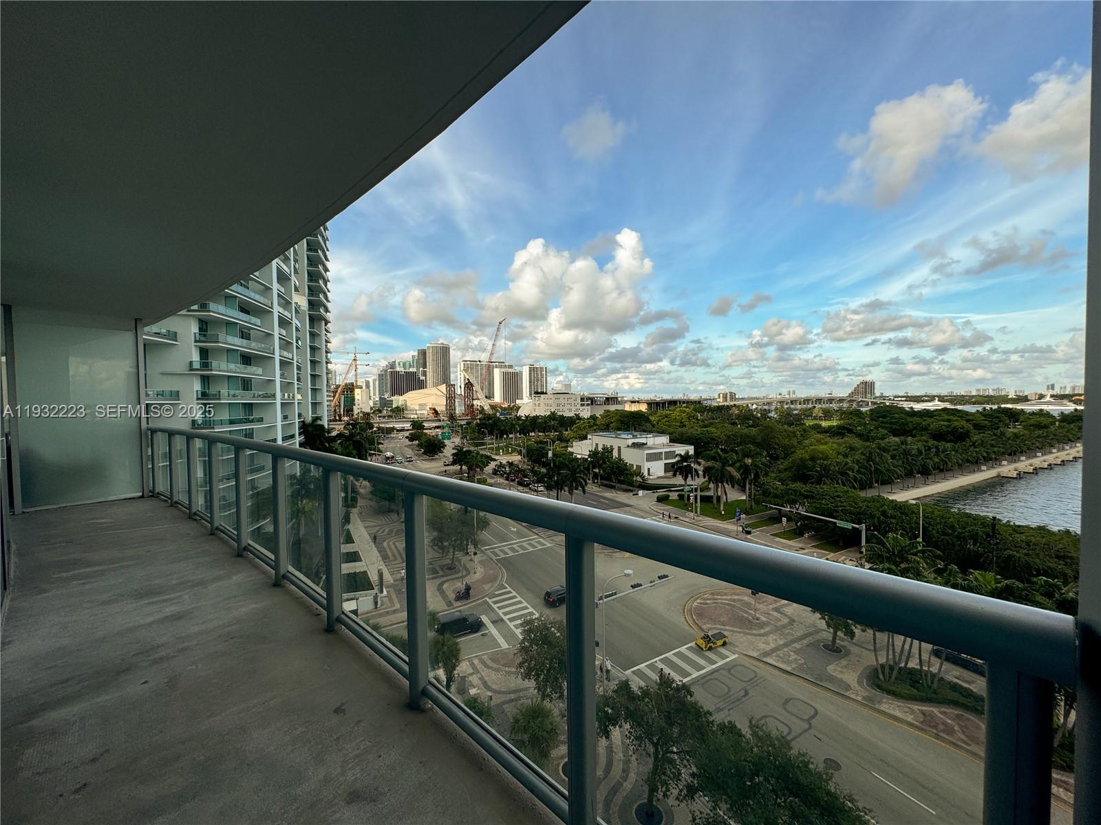 888 Biscayne Boulevard, Unit 709 Miami, FL 33132 - Photo 17 of 48 a view of city from a balcony