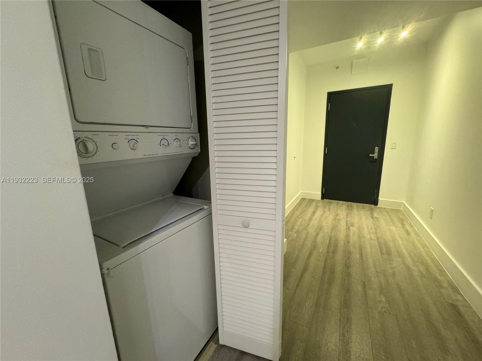 888 Biscayne Boulevard, Unit 709 Miami, FL 33132 - Photo 32 of 48 a bathroom with a sink and a toilet