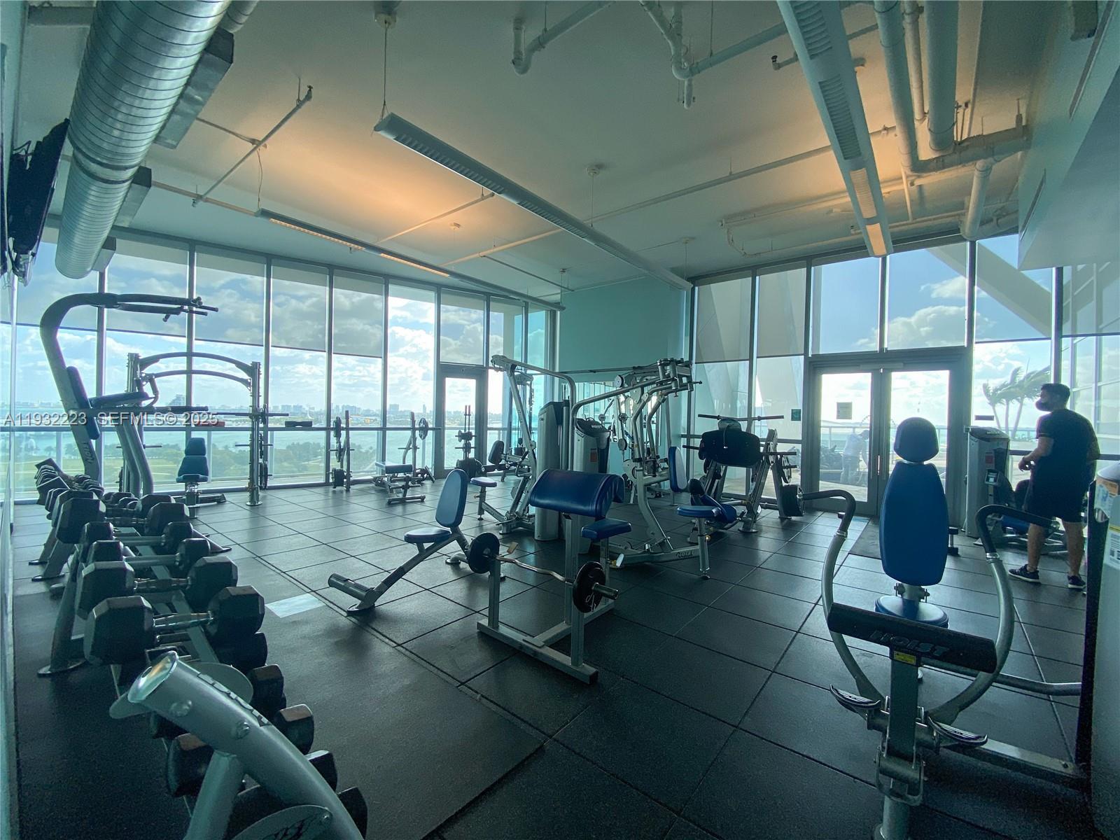 888 Biscayne Boulevard, Unit 709 Miami, FL 33132 - Photo 8 of 48 a living room view with furniture