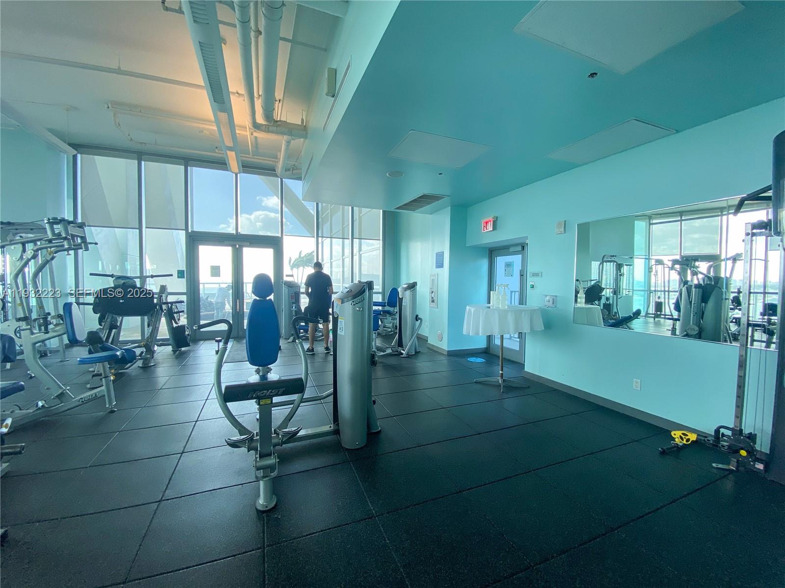 888 Biscayne Boulevard, Unit 709 Miami, FL 33132 - Photo 9 of 48 a lobby with furniture and floor to ceiling window