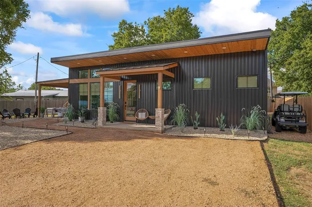 front view of a house with a patio