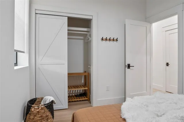 a view of a hallway with washer and dryer