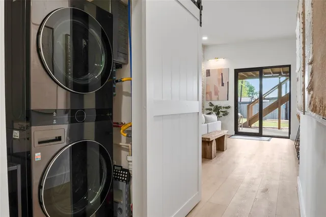 a view of a house with a backyard patio and swimming pool