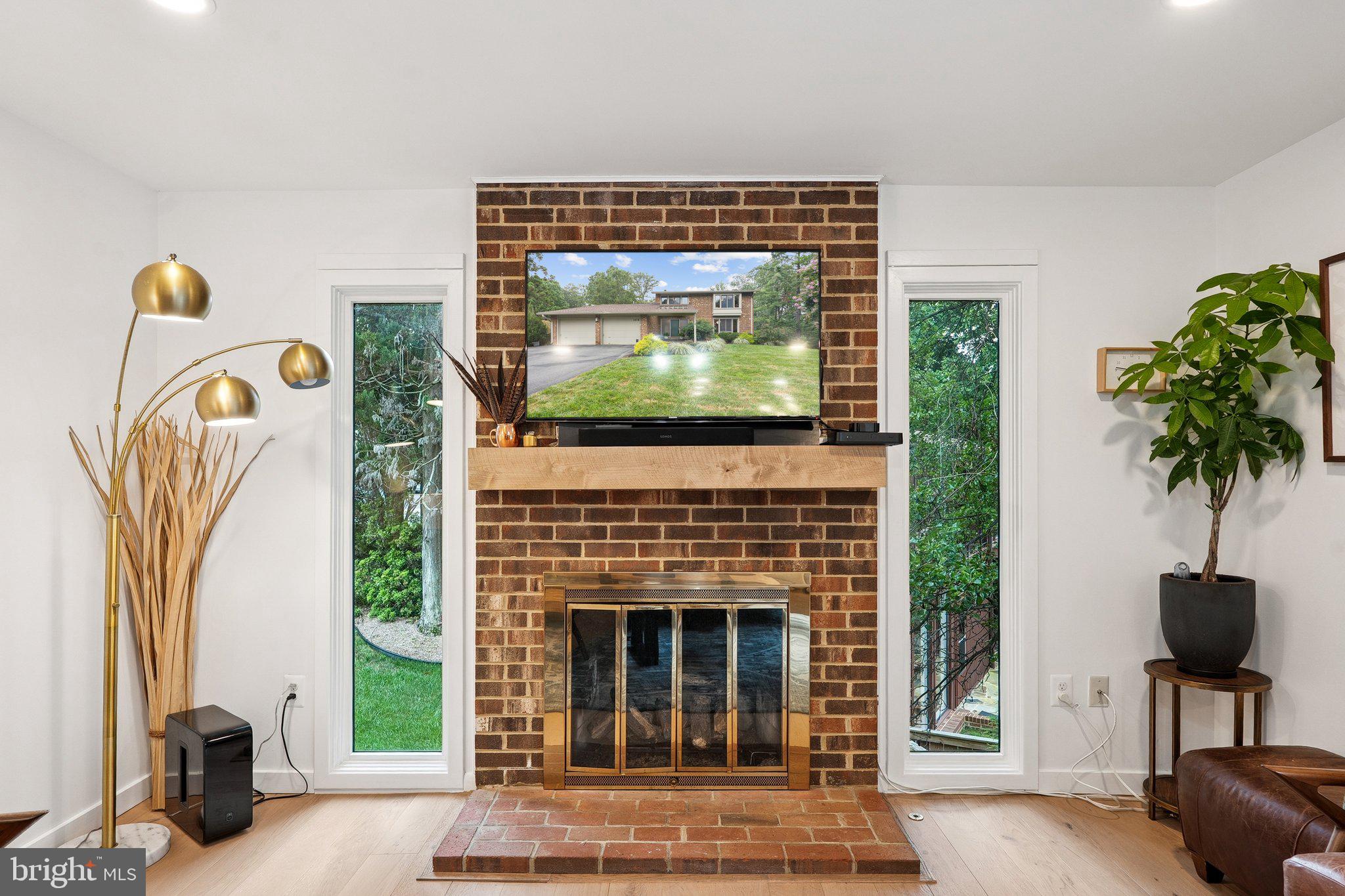 1416 Wolftrap Run Road Vienna, VA 22182 - Photo 8 of 29 Cozy Gas Fireplace in Family Room