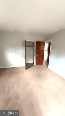 a bathroom with a bathtub and toilet