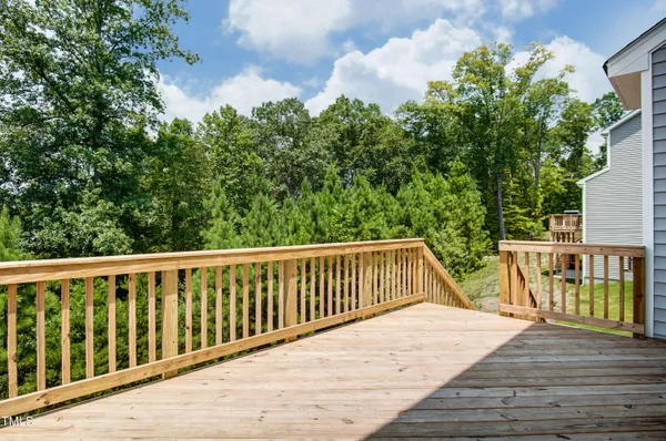 a view of a house with a roof deck