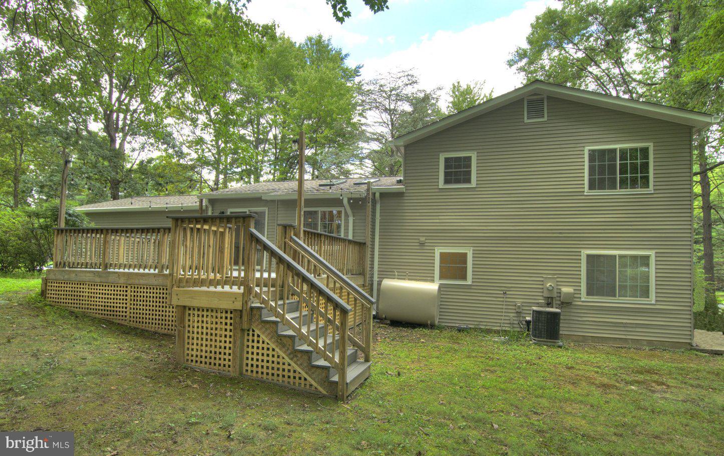 Charming home with spacious deck.