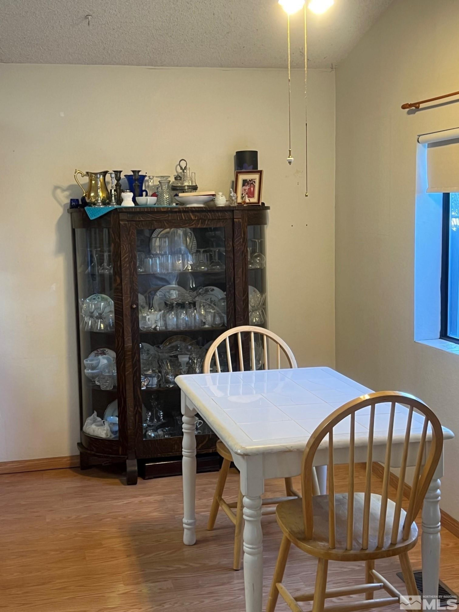 2690 Daffodil Way Reno, NV 89512 - Photo 14 of 20 a view of a dining room with furniture