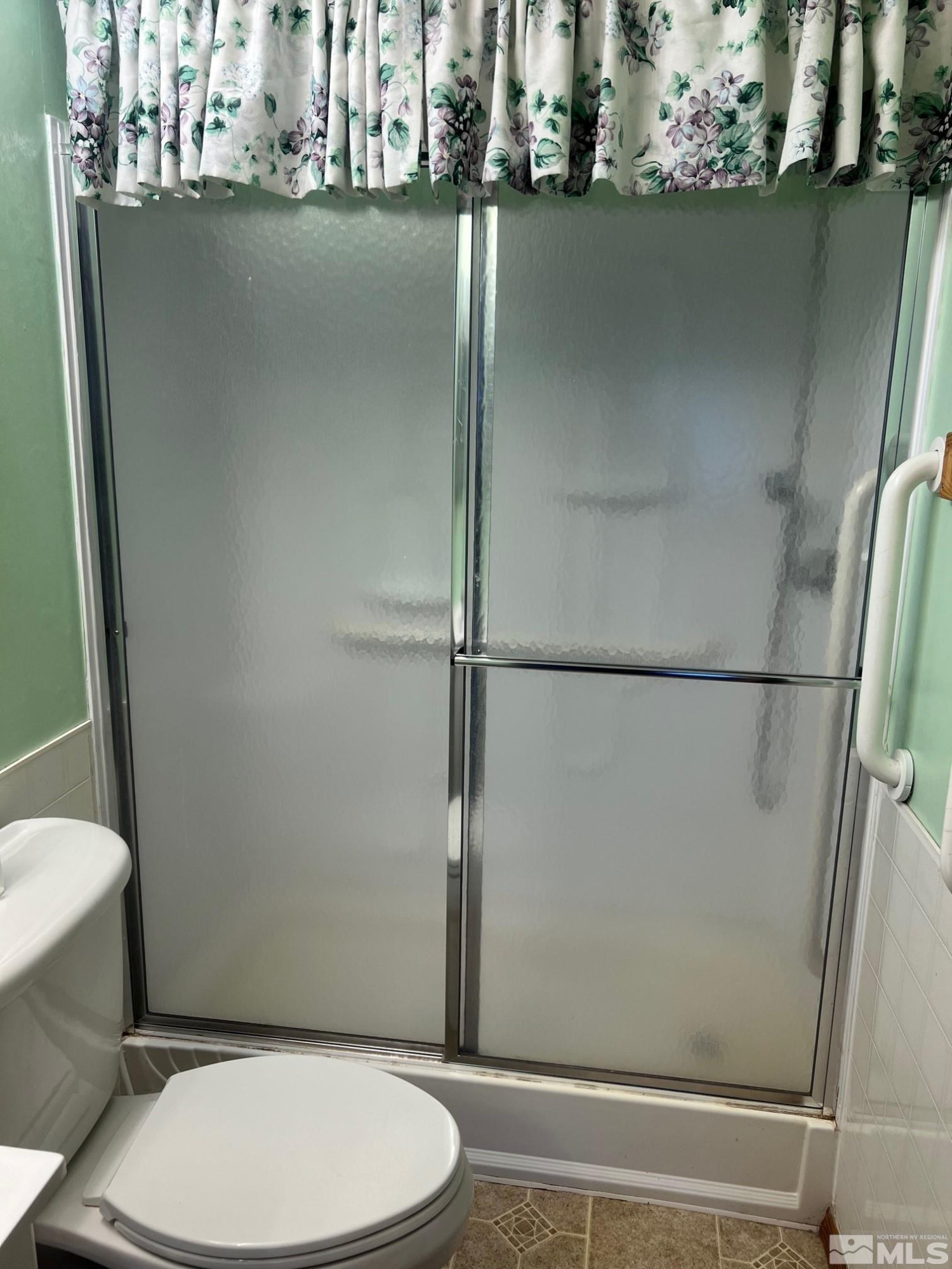 2690 Daffodil Way Reno, NV 89512 - Photo 17 of 20 a bathroom with a toilet and a shower