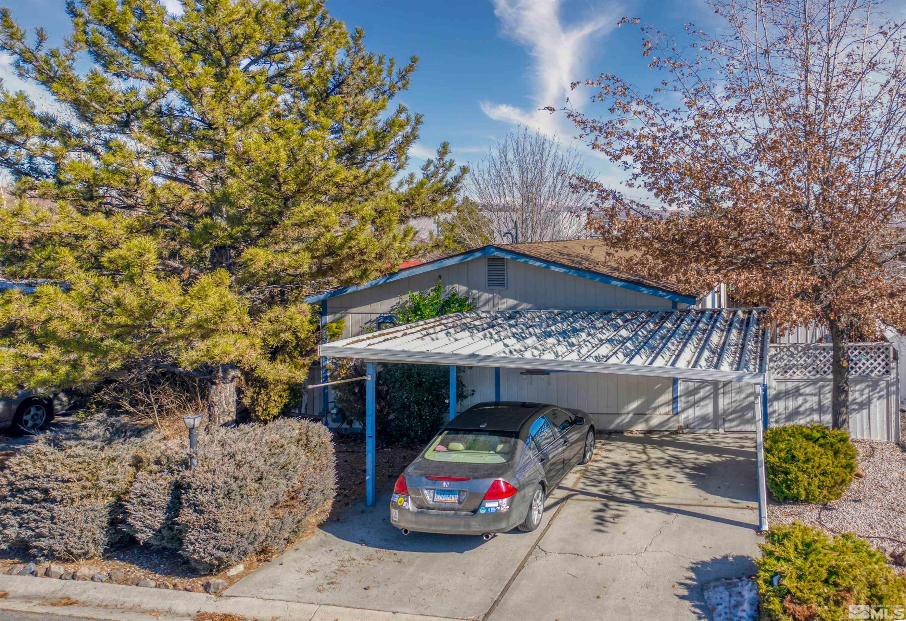 2690 Daffodil Way Reno, NV 89512 - Photo 2 of 20 a car parked in front of house