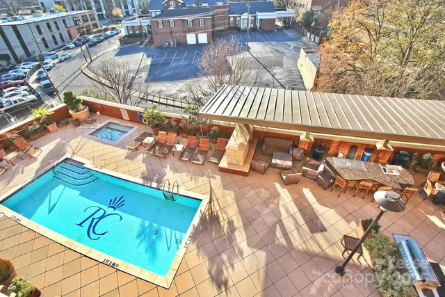 a view of a patio with table and chairs with wooden floor