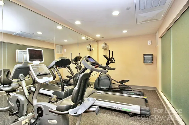 a view of a room with gym equipment