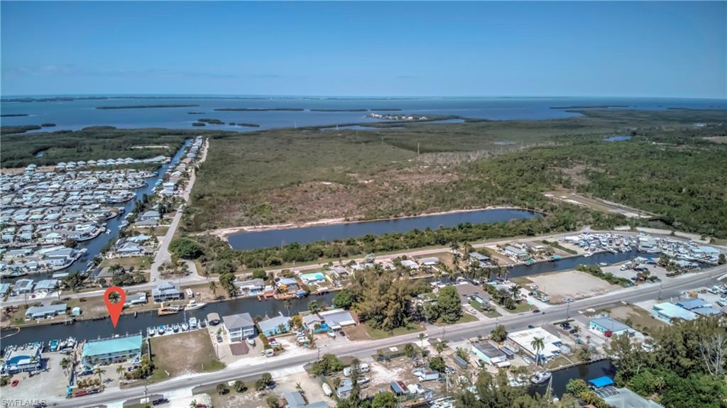 3215 Stringfellow Road, Unit 2A St. James City, FL 33956 - Photo 26 of 31 a view of an ocean and beach