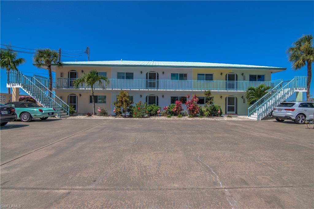 3215 Stringfellow Road, Unit 2A St. James City, FL 33956 - Photo 29 of 31 a view of house with outdoor space