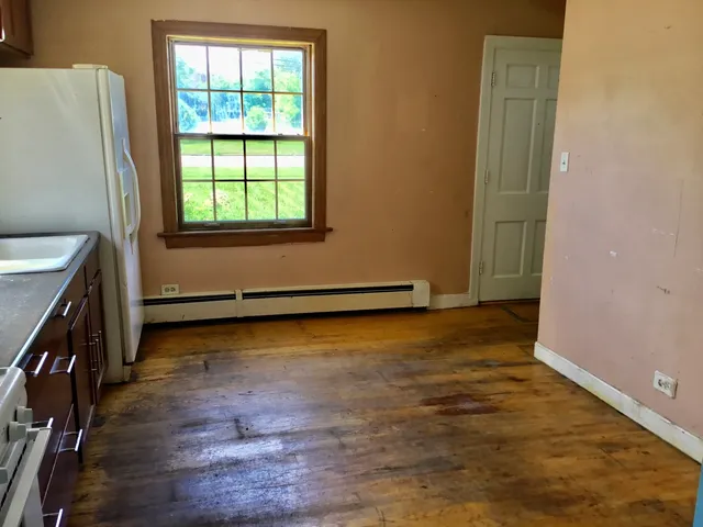 a view of an empty room and window