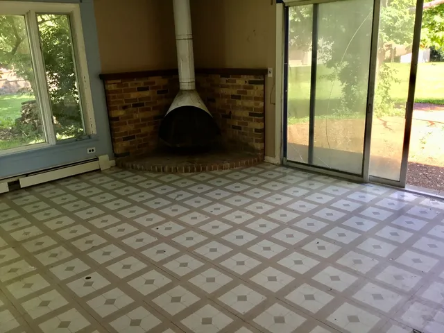 a view of an empty room and window