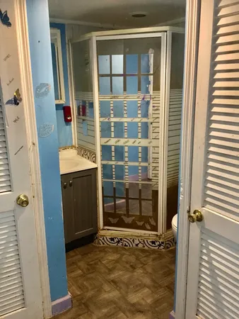 a bedroom with a bed