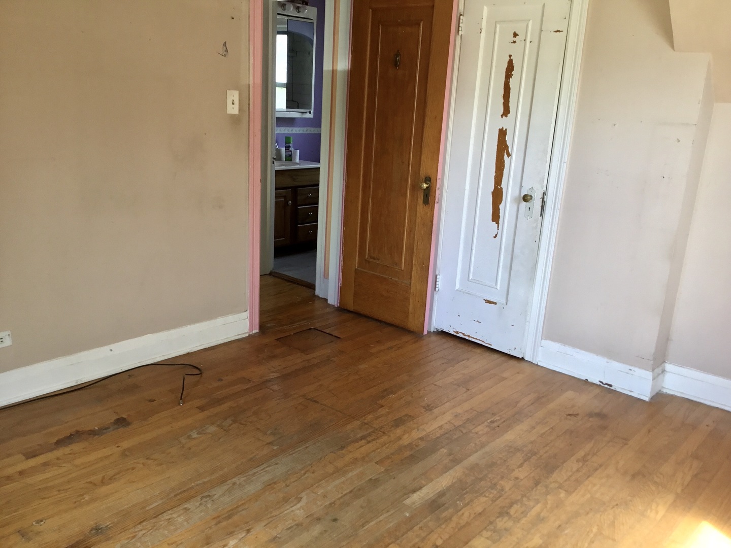 206 East Camp McDonald Road Prospect Heights, IL 60070 - Photo 28 of 57 an empty room with wooden floor and closet