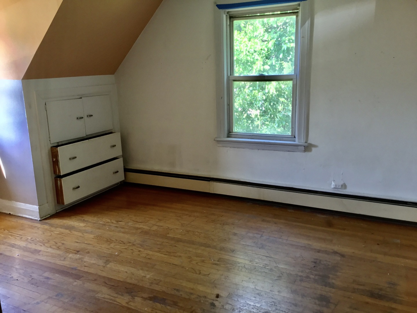 206 East Camp McDonald Road Prospect Heights, IL 60070 - Photo 30 of 57 a view of a room with window and cabinet