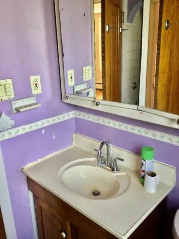 a bathroom with a sink and a toilet