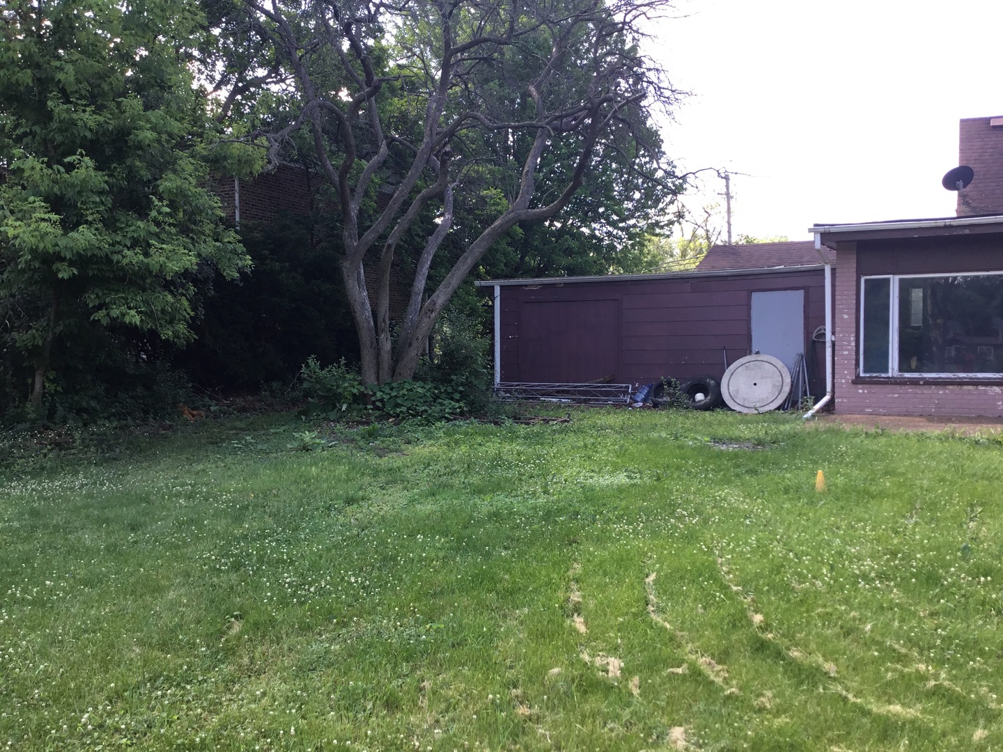 206 East Camp McDonald Road Prospect Heights, IL 60070 - Photo 55 of 57 a view of a wooden fence and a yard