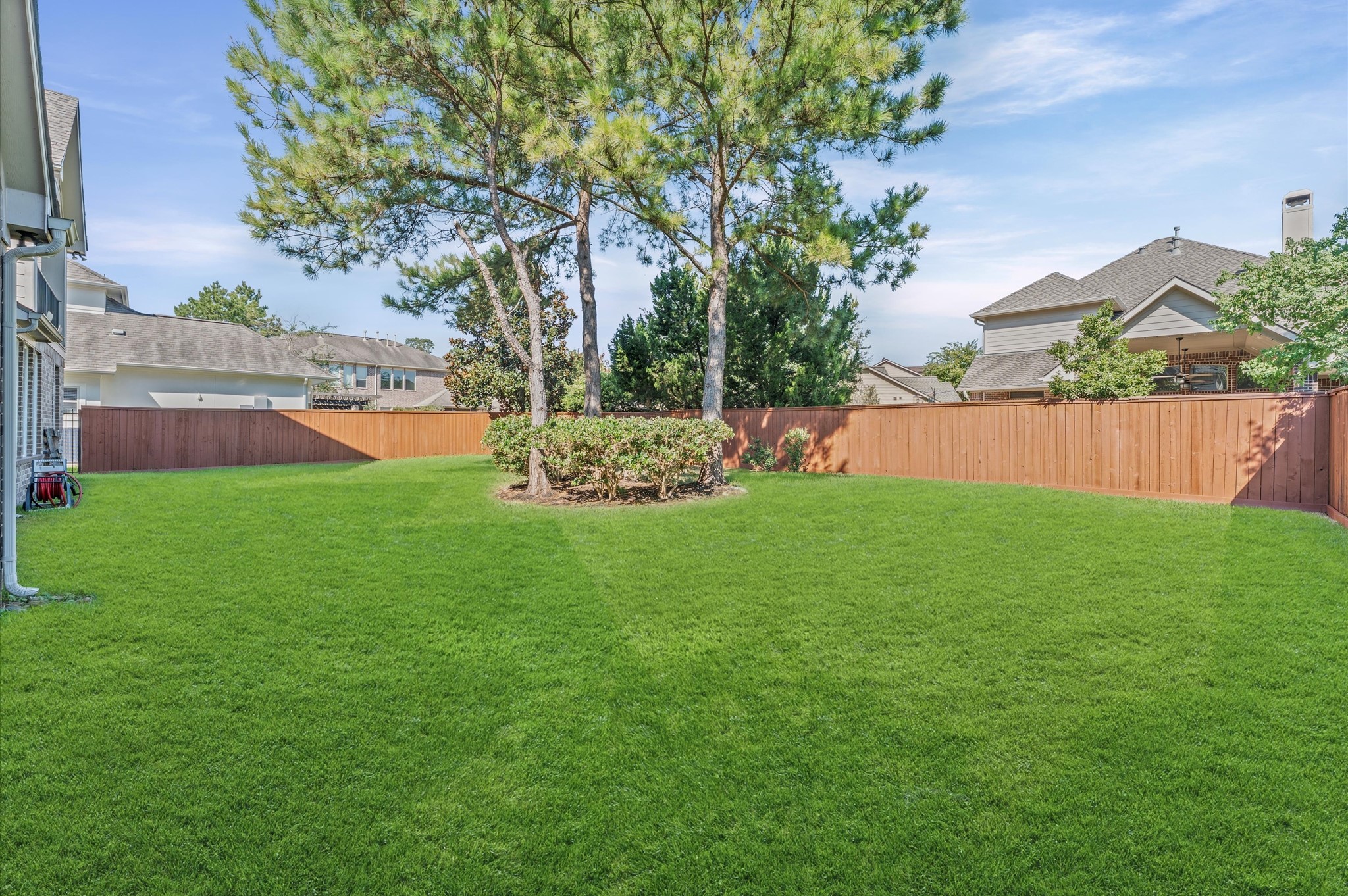7 North Beech Springs Circle Spring, TX 77389 - Photo 46 of 50 a view of a garden with an tree