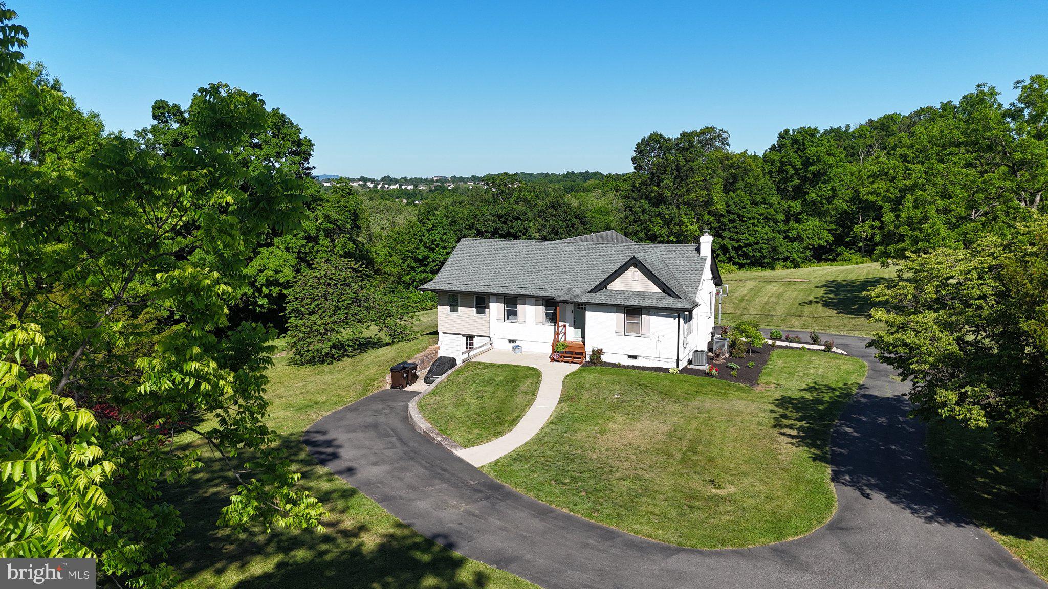 44 Worman Road Douglassville, PA 19518 - Photo 4 of 69 Charming home nestled in lush greenery.