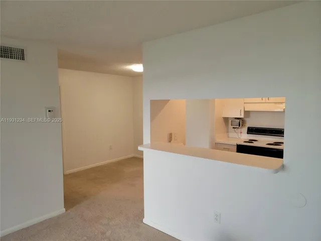 $1,690 | 1701 Village Boulevard, Unit 205, West Palm Beach, FL 33409