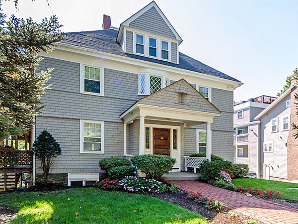 36 Cummings Road, Unit 2 Boston, MA 02135 - Photo 1 of 15 a front view of a house with a yard and plants