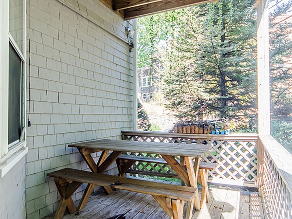 36 Cummings Road, Unit 2 Boston, MA 02135 - Photo 14 of 15 a blue bench sitting in front of a building