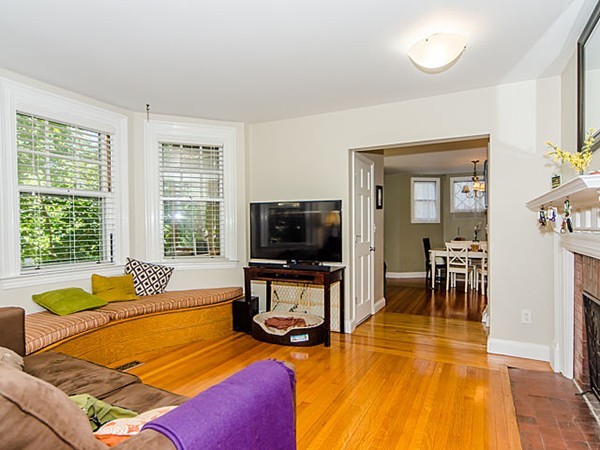 36 Cummings Road, Unit 2 Boston, MA 02135 - Photo 2 of 15 a living room with furniture and a flat screen tv